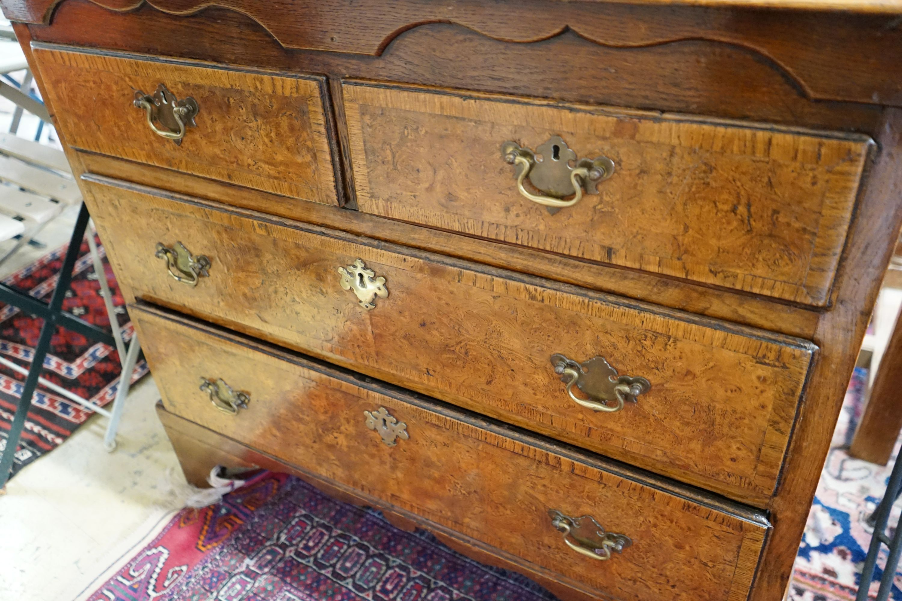 A George III and later banded pollard oak four drawer chest on bracket feet, width 93cm, depth 49cm, height 84cm